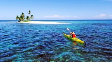 Kayaking to an island in Belize